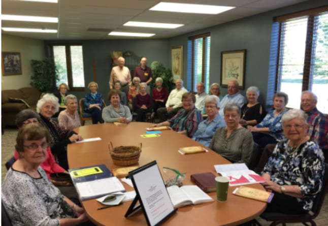 church family meeting around a table